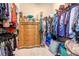 Walk-in closet featuring plenty of built-in storage and organizational spaces at 19367 Coastal Shore Ter, Land O Lakes, FL 34638