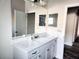 Bathroom boasts modern finishes, including a stylish mirror, countertop, and sink at 422 Shannon Estates Ct, Plant City, FL 33563