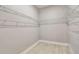 Walk-in closet with wire shelving for ample storage at 422 Shannon Estates Ct, Plant City, FL 33563