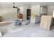 Open-concept living space featuring an island, with construction in progress at 422 Shannon Estates Ct, Plant City, FL 33563