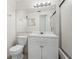 Bathroom with white vanity, large mirror and shower at 5940 30Th S Ave # 209, Gulfport, FL 33707
