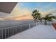 The balcony offers stunning panoramic views of the surrounding water and coastline at 6423 Driftwood Dr, Hudson, FL 34667