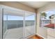 Waterfront balcony with sliding glass doors and amazing views at 6423 Driftwood Dr, Hudson, FL 34667