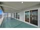 A spacious balcony offering water views, perfect for outdoor relaxation and entertainment at 6423 Driftwood Dr, Hudson, FL 34667