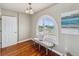 Arched window with plantation shutters in the sitting area at 6423 Driftwood Dr, Hudson, FL 34667