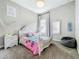 Charming bedroom with mermaid decor, unique lighting, and comfortable carpet flooring at 13028 Homestead Ln, Parrish, FL 34219