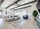 Living area featuring decorative rug, sofa, and natural lighting at 13028 Homestead Ln, Parrish, FL 34219