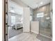 The main bathroom features a tiled shower and access to the main bedroom at 13028 Homestead Ln, Parrish, FL 34219