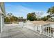 Rooftop deck offers panoramic views of the surrounding neighborhood and mature trees at 4902 Stolls Ave, Tampa, FL 33615