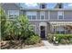 Charming townhome exterior with well-maintained landscaping, offering curb appeal and a welcoming entrance at 8856 Christie Dr # 0, Largo, FL 33771