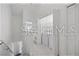 Bright hallway with storage and access to the laundry room at 8856 Christie Dr # 0, Largo, FL 33771