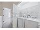 Well-organized laundry room featuring modern washer and dryer appliances at 8856 Christie Dr # 0, Largo, FL 33771