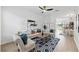Bright living room featuring modern furnishings, an accent rug, and lots of natural light at 8856 Christie Dr # 0, Largo, FL 33771