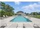 Sparkling swimming pool with lounge chairs, offering a refreshing escape and a resort-like ambiance at 8856 Christie Dr # 0, Largo, FL 33771