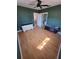 Comfortable bedroom features an open closet, hardwood floors and an open doorway at 1501 41St N Ave, St Petersburg, FL 33703