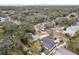 Expansive aerial view of the neighborhood showcasing the area's lush greenery, mature trees, and residential charm at 11592 110Th Ter, Seminole, FL 33778