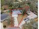 An aerial view of a single-story home with a large yard and driveway at 11592 110Th Ter, Seminole, FL 33778