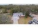 Stunning aerial view of the home with beautiful landscaping and mature trees surrounding the property at 11592 110Th Ter, Seminole, FL 33778