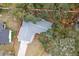 An aerial view of the home with property boundary outlined in red showing the proximity to the neighborhood at 11592 110Th Ter, Seminole, FL 33778