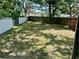 Spacious backyard featuring large trees and a partial view of surrounding properties at 11592 110Th Ter, Seminole, FL 33778