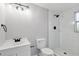 Clean, modern bathroom showcasing new shower, vanity, lighting, and fixtures at 11592 110Th Ter, Seminole, FL 33778