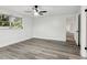 This airy bedroom showcases wood-look floors and ample natural light at 11592 110Th Ter, Seminole, FL 33778