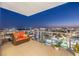 Spacious balcony featuring comfortable seating and stunning city views at night at 301 1St S St # 2006, St Petersburg, FL 33701