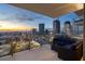 Stylish balcony with comfortable seating offers stunning sunset views of the cityscape at 301 1St S St # 2006, St Petersburg, FL 33701