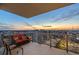 City view from a furnished balcony with an orange sunset and city skyline at 301 1St S St # 2006, St Petersburg, FL 33701