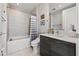 Chic bathroom with modern fixtures, a bathtub, and a stylish vanity area at 301 1St S St # 2006, St Petersburg, FL 33701