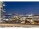 Night view from a balcony overlooking the city skyline and waterfront at 301 1St S St # 2006, St Petersburg, FL 33701