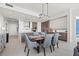 Open concept dining area featuring a modern table set, kitchen and stunning natural light at 301 1St S St # 2006, St Petersburg, FL 33701