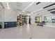 The community gym is fully equipped with machines and free weights, with a mirrored wall, and modern fixtures at 301 1St S St # 2006, St Petersburg, FL 33701