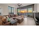 Modern living room with floor-to-ceiling windows offering city views and comfortable seating at 301 1St S St # 2006, St Petersburg, FL 33701