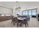 Spacious living area with dining table, modern lighting, tile floors, and city views at 301 1St S St # 2006, St Petersburg, FL 33701