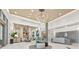 Luxurious lobby with modern chandeliers, a reception desk, and comfortable seating areas for residents and visitors at 301 1St S St # 2006, St Petersburg, FL 33701