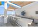 The outdoor bar offers ample seating and a grilling area, perfect for entertaining guests at 301 1St S St # 2006, St Petersburg, FL 33701