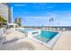 Upscale pool area with lounge chairs overlooking the water, perfect for relaxation and enjoyment at 301 1St S St # 2006, St Petersburg, FL 33701