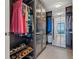Spacious walk-in closet with built-in storage solutions for organized clothing and shoes at 301 1St S St # 2006, St Petersburg, FL 33701