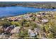 Beautiful aerial view of waterfront community with lush landscaping and stunning lake views at 402 Pineapple St, Tarpon Springs, FL 34689