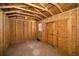 Inside the shed with plywood walls, ceiling and dirt floor at 402 Pineapple St, Tarpon Springs, FL 34689