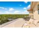 Expansive outdoor balcony featuring luxury seating perfect for relaxing or entertaining with gorgeous scenery at 8731 Betty St, Port Richey, FL 34668