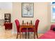 Cozy game room with a chess table, seating, and views to the landing, offering a comfortable and inviting space at 8731 Betty St, Port Richey, FL 34668