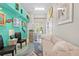Inviting living room featuring a mini-bar area, contemporary decor, and a cozy seating arrangement at 8731 Betty St, Port Richey, FL 34668