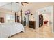 Spacious main bedroom features a fireplace, sitting area, walk-out balcony and stylish ensuite bath at 8731 Betty St, Port Richey, FL 34668