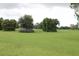 Lush green golf course with mature trees and landscaping at 9705 45Th N Way, Pinellas Park, FL 33782