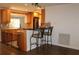 Open kitchen with granite countertops and breakfast bar with seating at 9705 45Th N Way, Pinellas Park, FL 33782