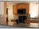 Kitchen with granite countertops, modern appliances, and tile backsplash at 9705 45Th N Way, Pinellas Park, FL 33782
