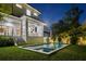 Backyard with swimming pool and outdoor kitchen, perfect for entertainment at 5038 W Dickens Ave, Tampa, FL 33629