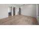 Bright bedroom with hardwood floors, closet, and access to bathroom at 5038 W Dickens Ave, Tampa, FL 33629